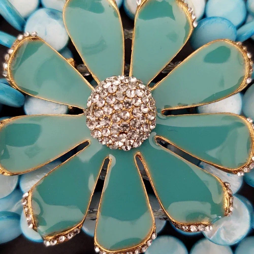 Dyed shell stretch bracelet w/enamel flower& cz's